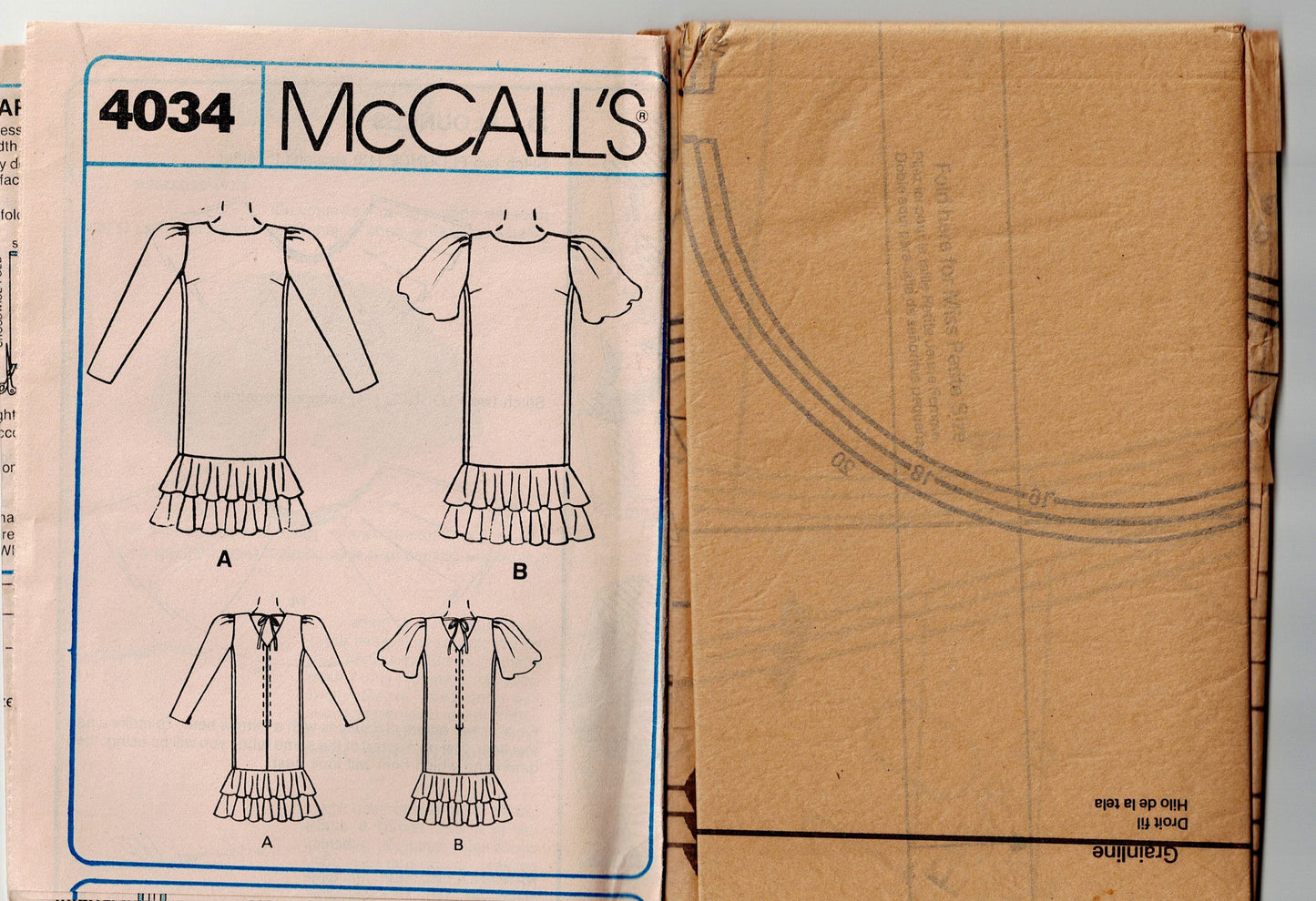 McCall's 4034 Womens LIZ ROBERTS Puff Sleeved Ruffled Hem Dress 1980s Vintage Sewing Pattern Size 16 - 20 UNCUT Factory Folded