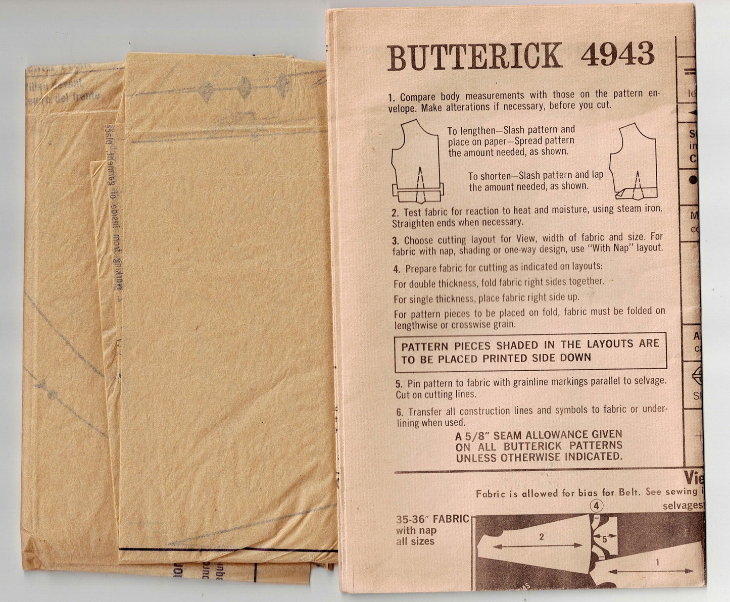 Butterick 4943 vintage sewing pattern with instructions on a cardboard background