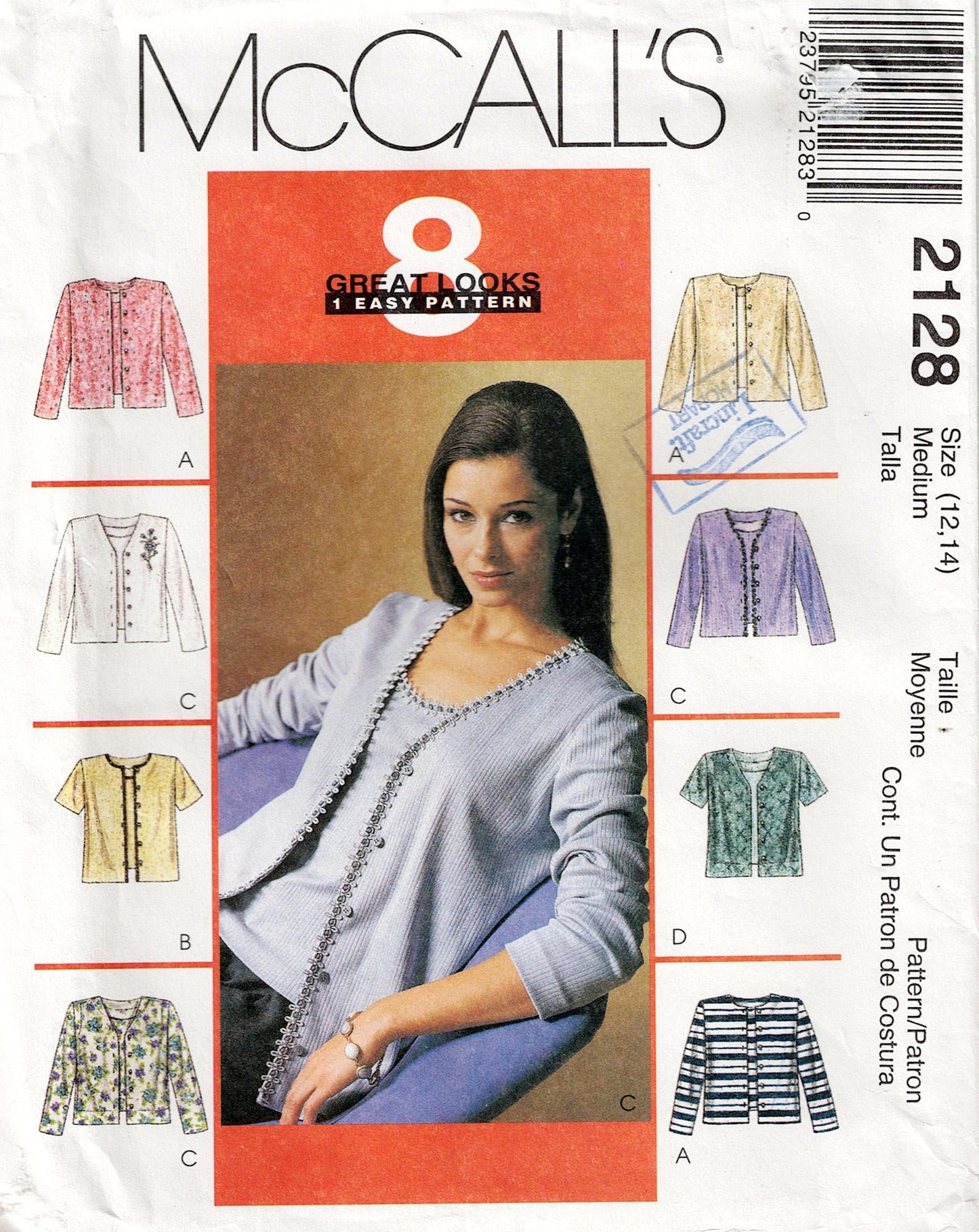 McCall's 2128 pattern packaging with a woman wearing a cardigan and various cardigan designs.