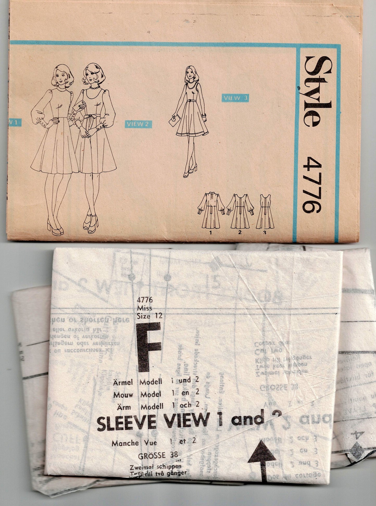 Style 4776 Womens Fit & Flared Dress with Puff Sleeves 1970s Vintage Sewing Pattern Size 12 Bust 34 inches