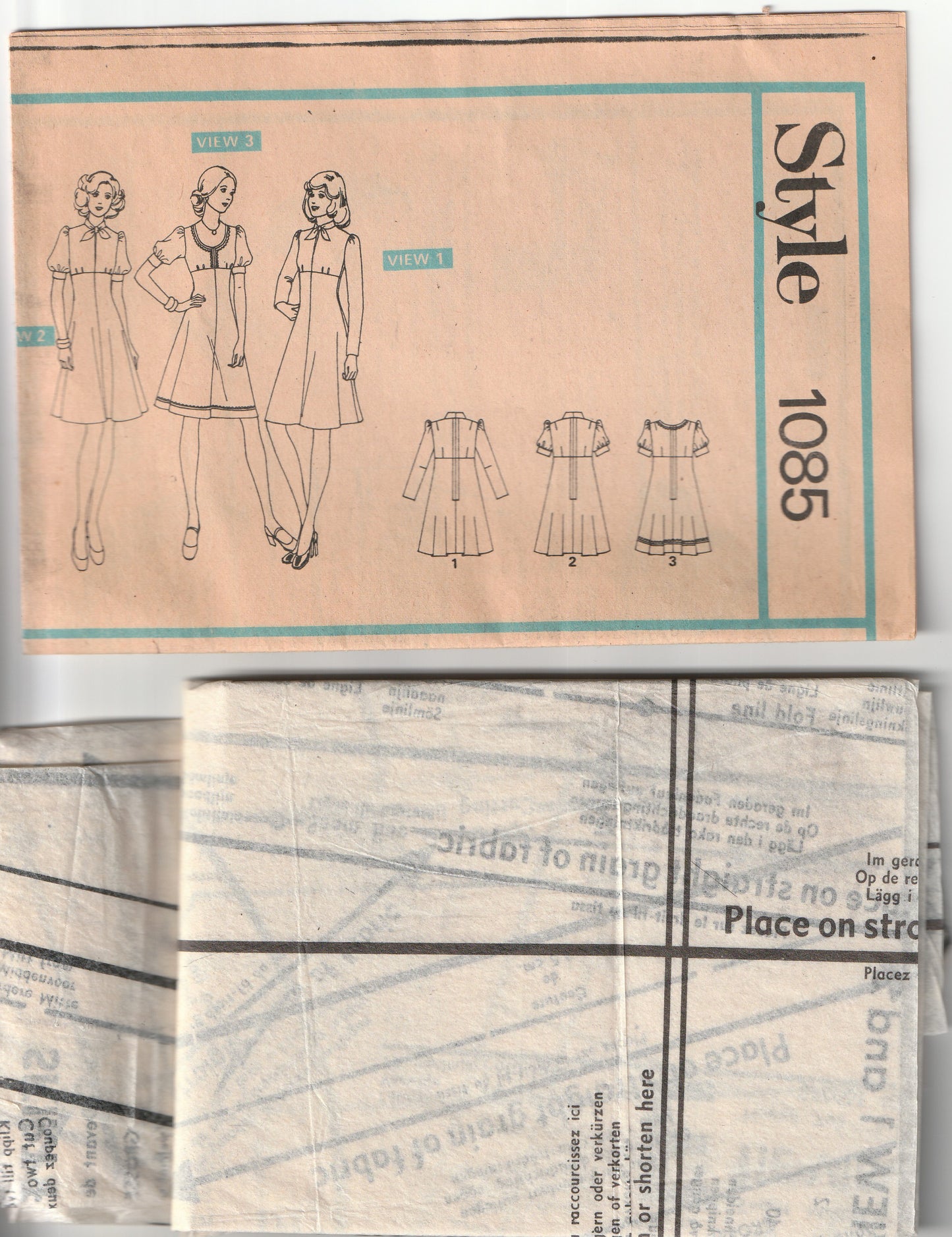 Style 1085 Womens Empire Waisted Puff Sleeved Dress with Optional Necktie 1970s Vintage Paper Sewing Pattern Size 14 Bust 36 Inches