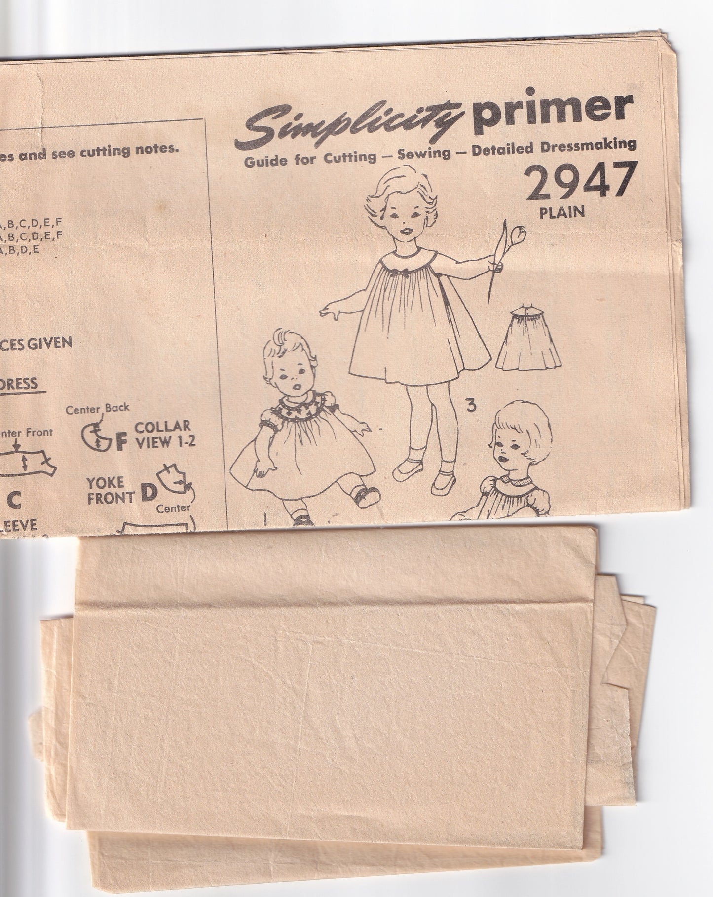 Simplicity 2947 Traditional Toddler Girls Round Yoked Smock Dress 1950s Vintage Paper Sewing Pattern Size 2 years