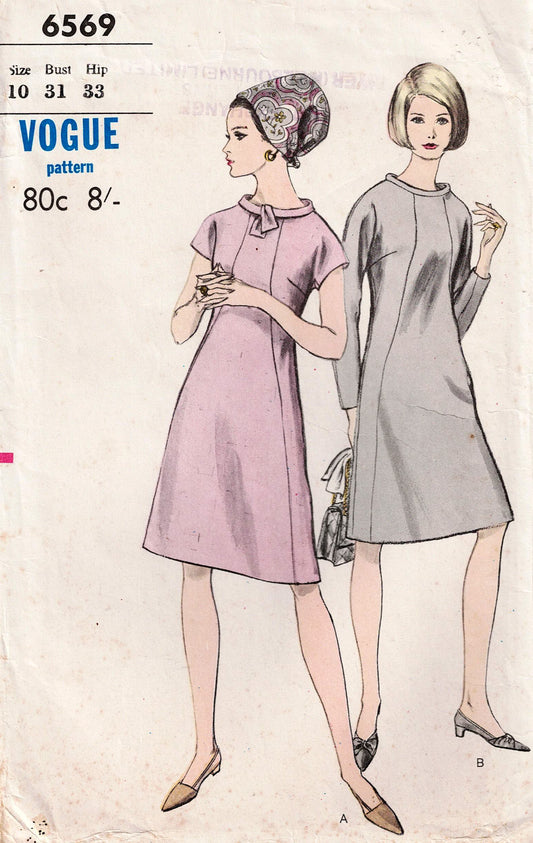 Vogue 6569
Vogue pattern 6569 with two women wearing dresses on a white background
