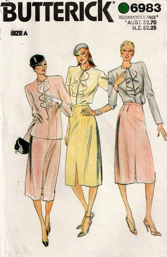 Butterick 6983 pattern cover with three women modeling outfits on a white background