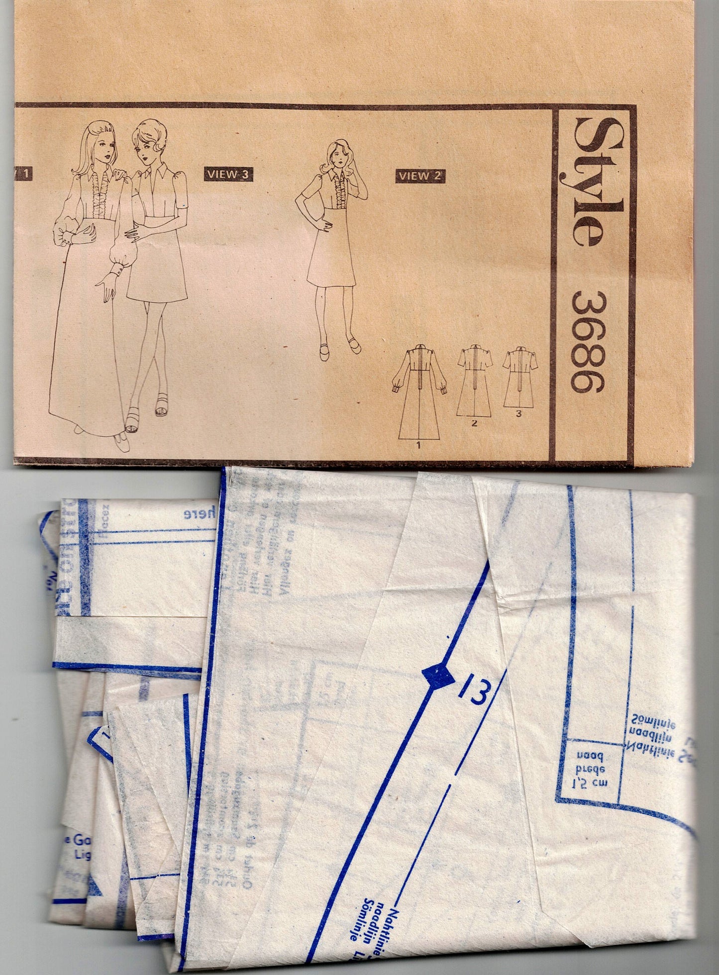 Style 3686 Womens Empire Waisted Puff Sleeved Dress 1970s Vintage Sewing Pattern Size 12 Bust 34 inches