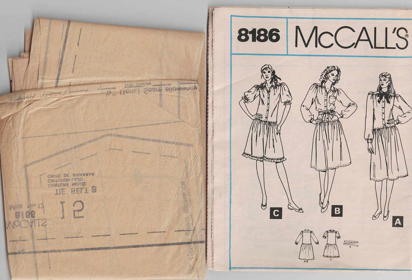 McCall's 8186 Womens Drop Waisted Puffy Sleeved Shirtdress 1980s Vintage Sewing Pattern Size 12 Bust 34 inches